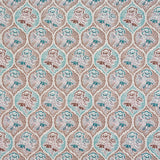 Detail of fabric in a floral damask print in shades of blue and brown on a cream field.