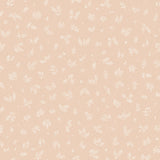 Detail of wallpaper in a minimal repeating leaf print in cream on a light pink field.