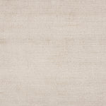 Broadloom carpet in a cut pile strié design in white.