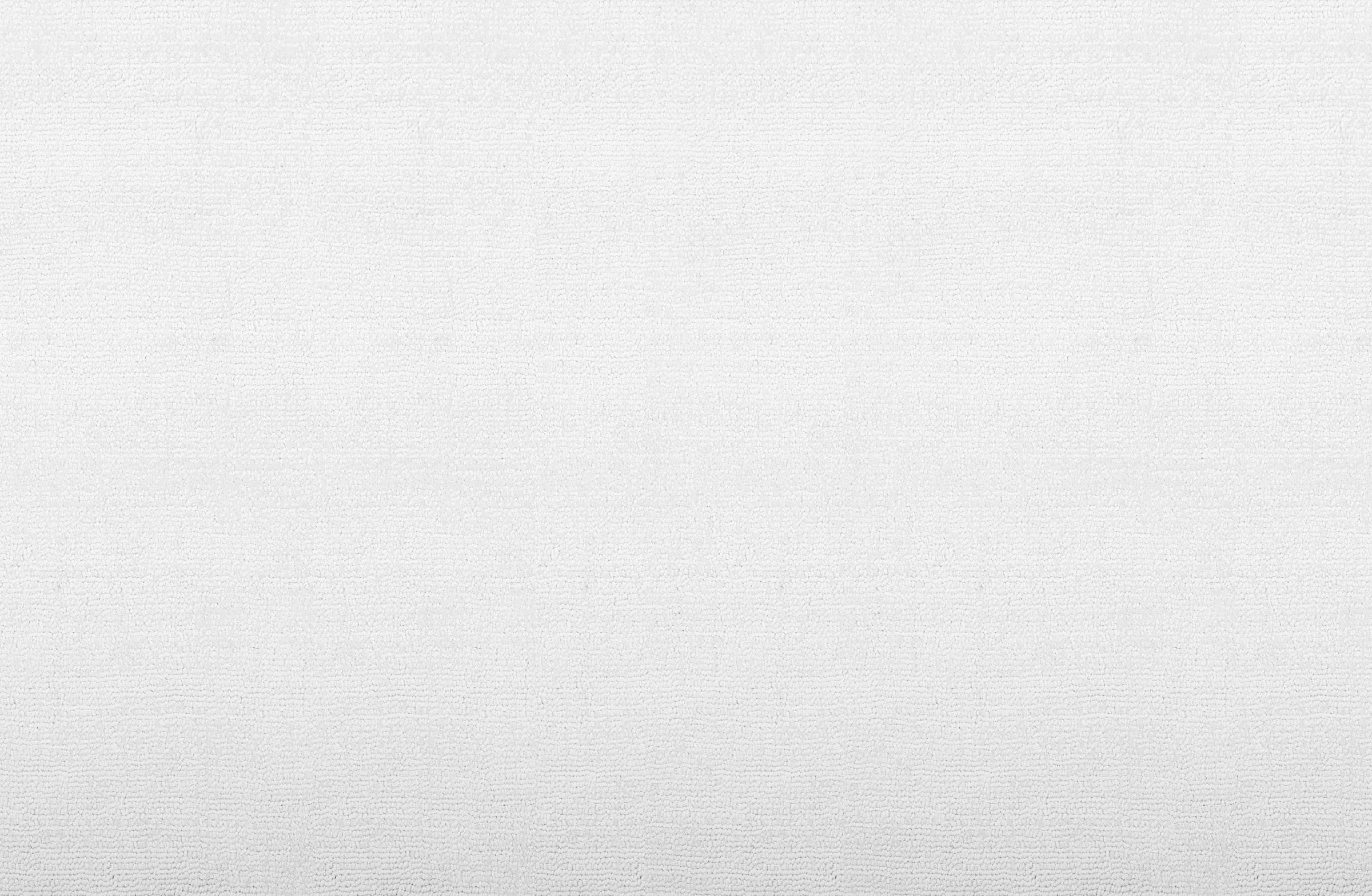 Broadloom carpet in a cut pile strié design in bright white.