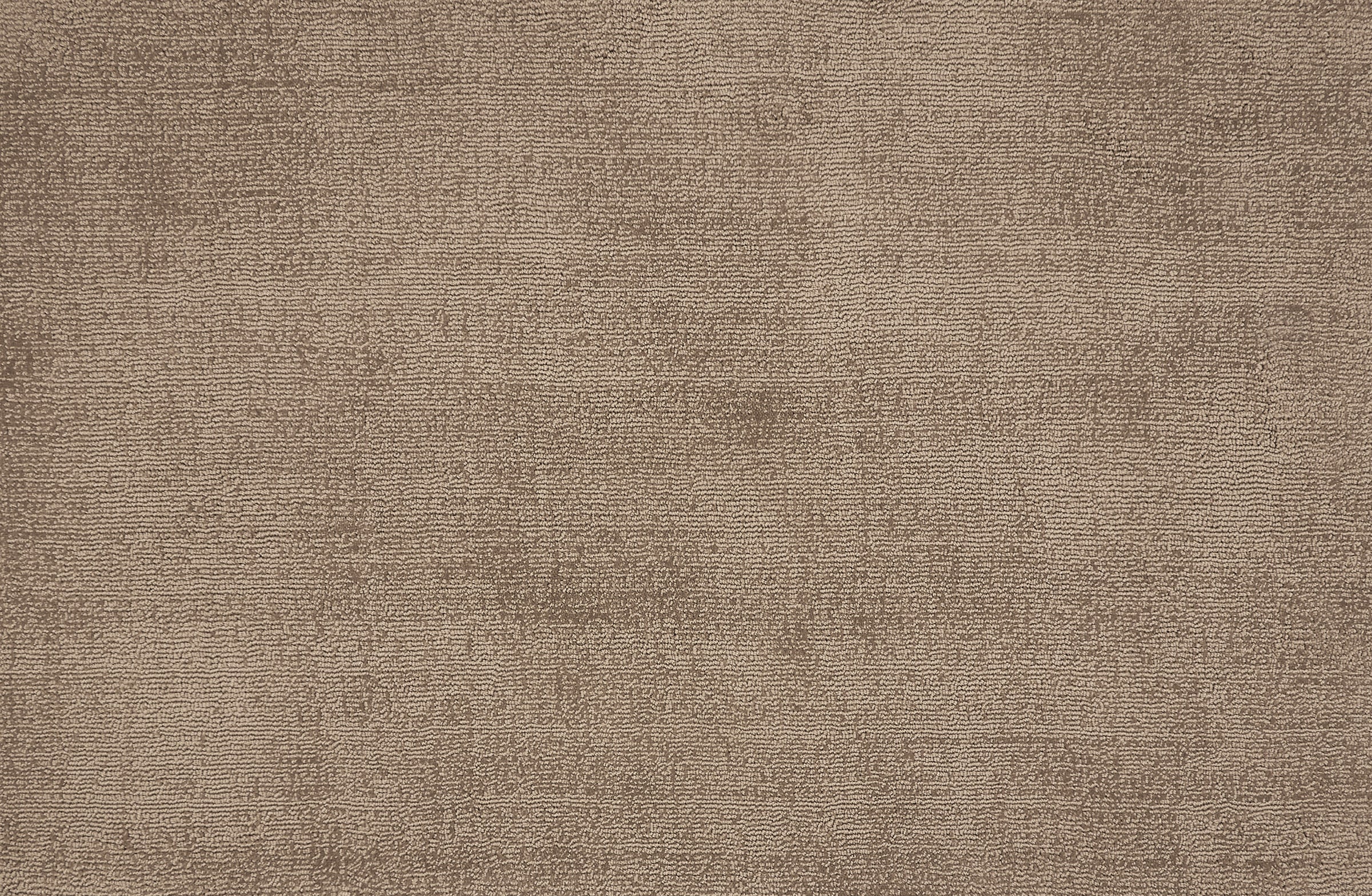 Broadloom carpet in a cut pile strié design in taupe