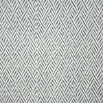 Broadloom carpet in a linear geometric design in blue and white. 