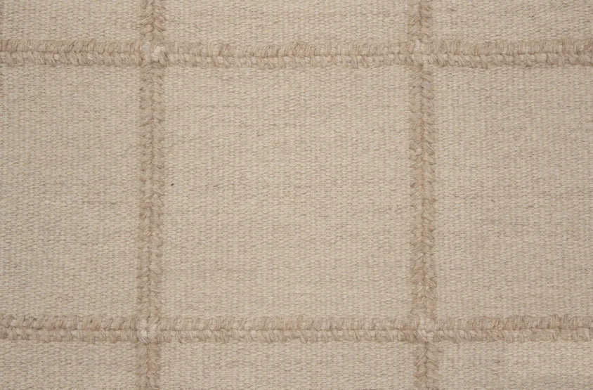 Broadloom carpet swatch in a checkered pattern in a neutral design