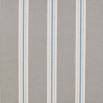 Detail of fabric in a repeating stripe print in white and light blue on a light gray field.