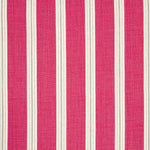 Detail of fabric in a repeating stripe print in white and gray on a pink field.