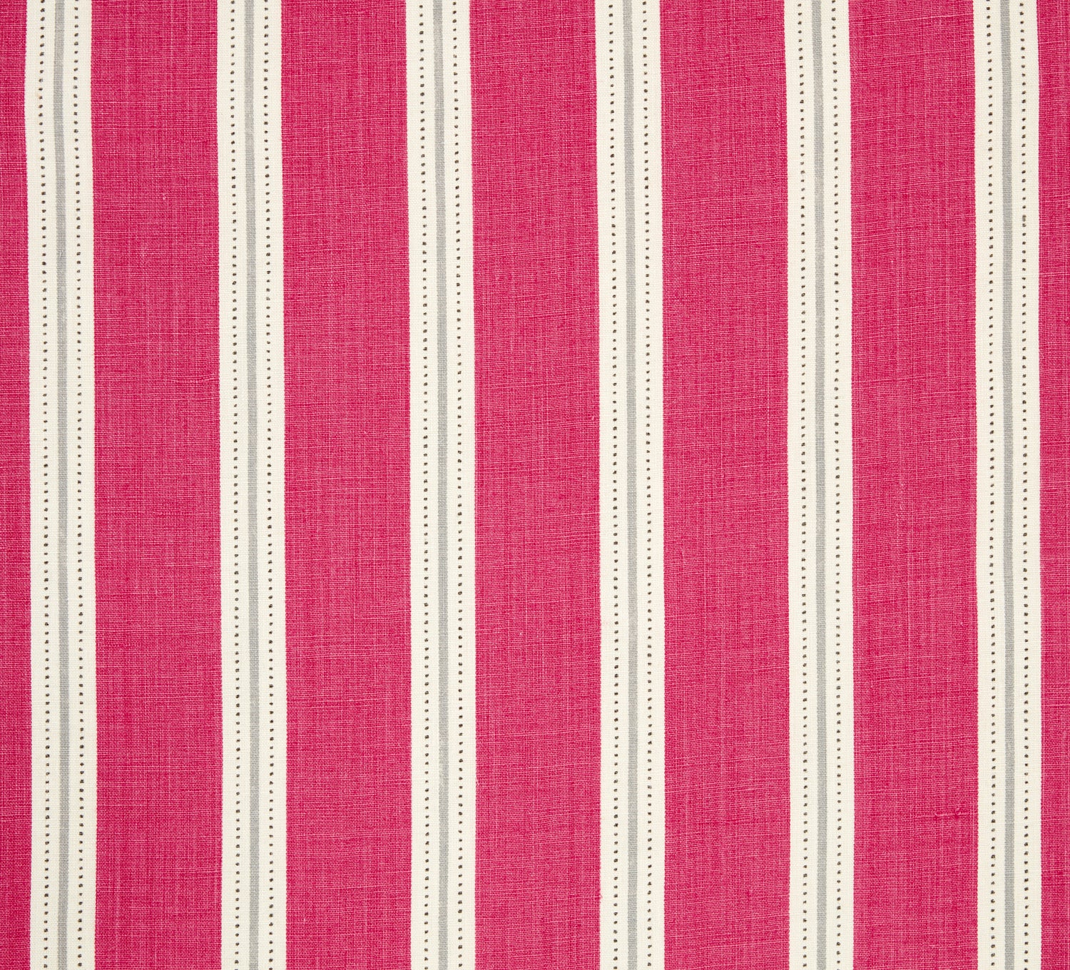 Detail of fabric in a repeating stripe print in white and gray on a pink field.