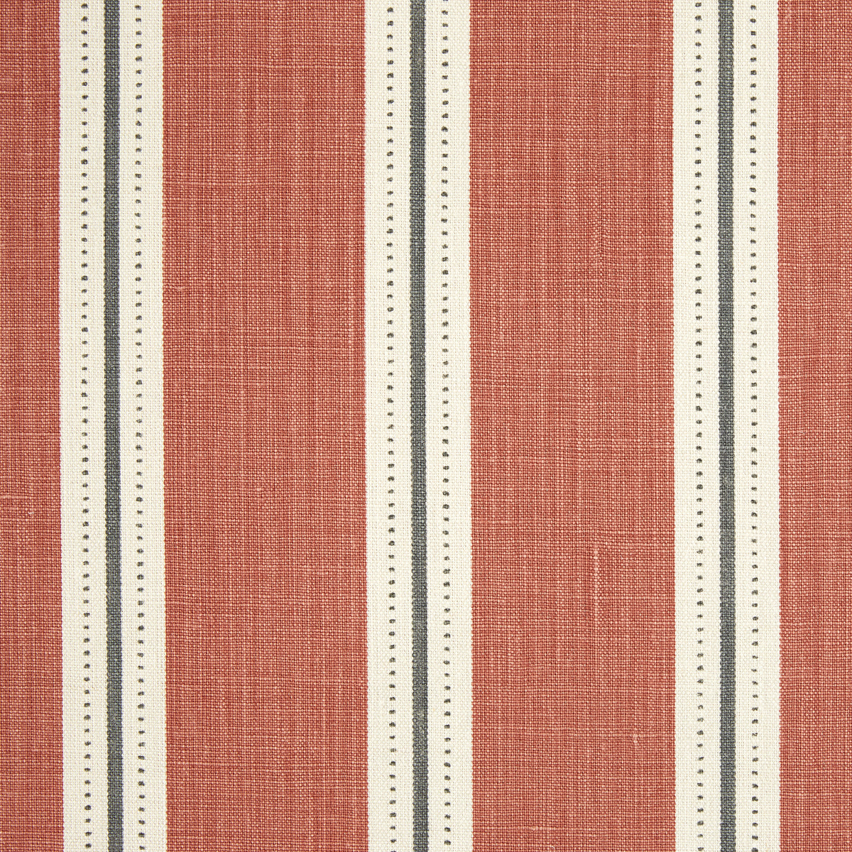 Detail of fabric in a repeating stripe print in white and gray on a burnt orange field.