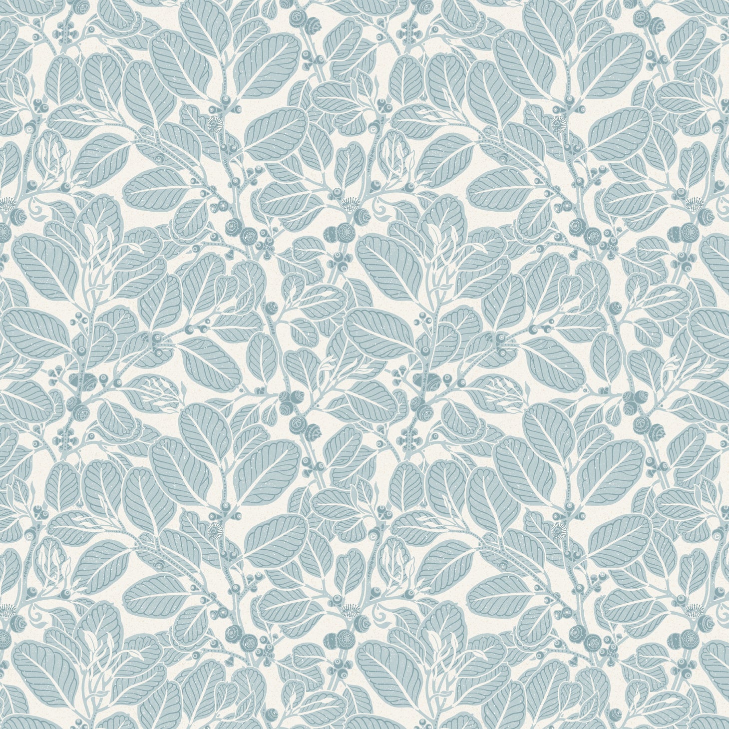 Two wooden chairs stand in front of a wall papered in a dense leaf and stem print in blue-gray and white.