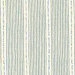 Detail of fabric in a repeating stripe and dash pattern in gray and blue on a cream field.