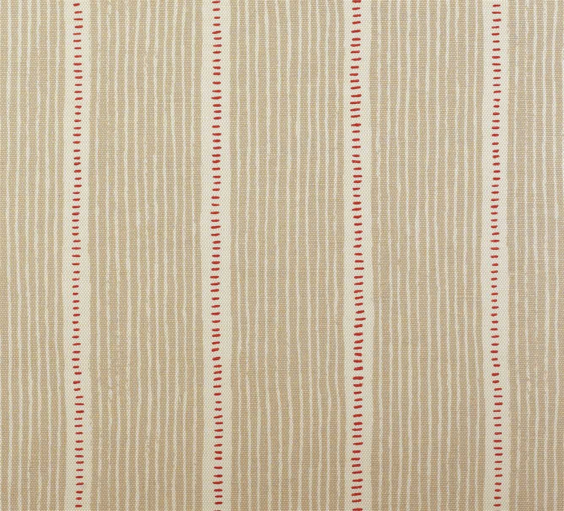 Detail of fabric in a repeating stripe and dash pattern in tan and red on a cream field.