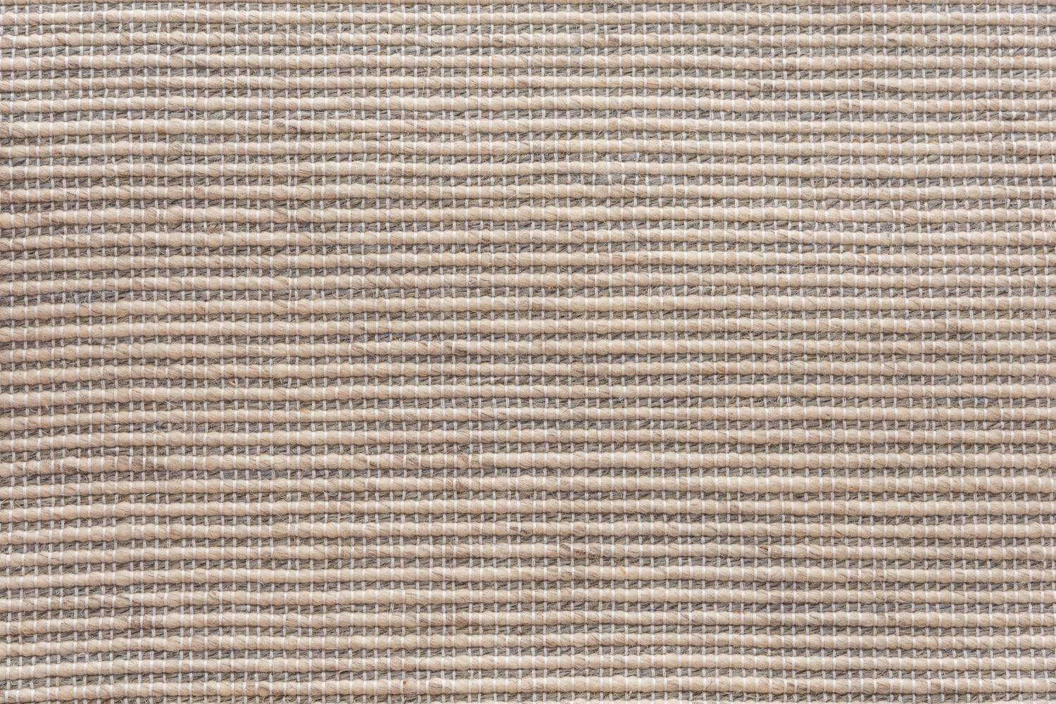 Broadloom in textural stripe in cream and grey. 