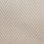 Broadloom carpet in a dimensional herringbone pattern in ivory. 