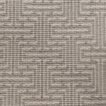 Broadloom carpet in a geometric stripe in cream and taupe. 