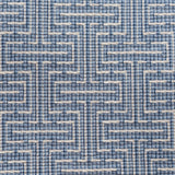 Broadloom carpet in a geometric stripe in cream and shades of blue. 