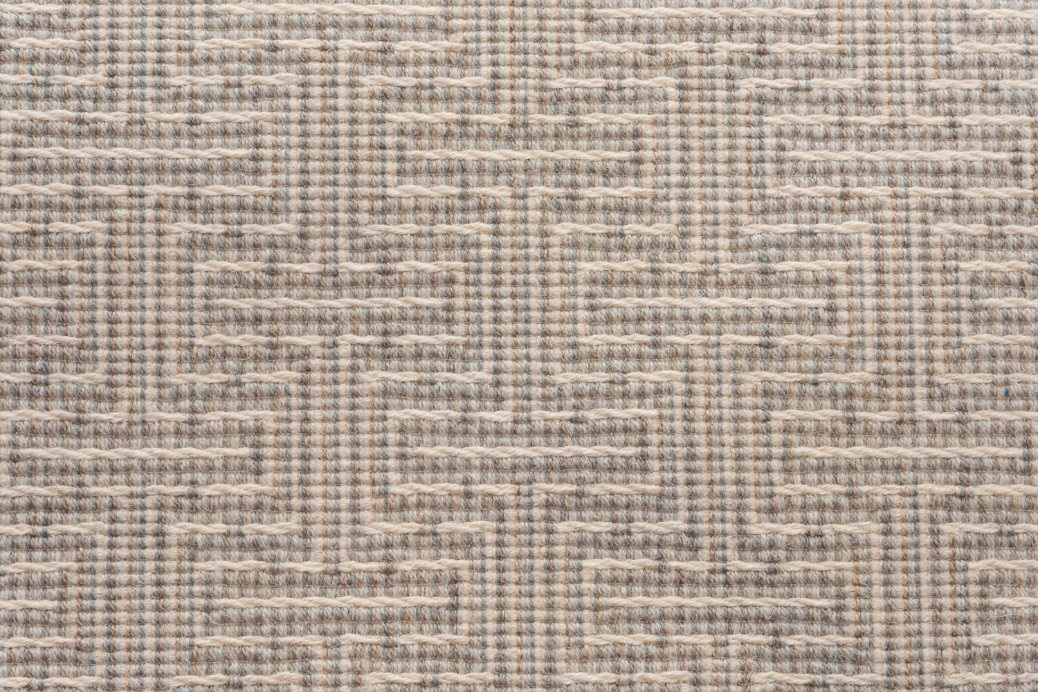 Broadloom carpet in a geometric stripe in cream and shades of taupe, sage and grey. 