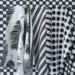 Performance fabrics in black and white in 
a palm print, moroccan star and simple stripe.