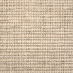 Broadloom carpet with textural weave in cream and grey. 
