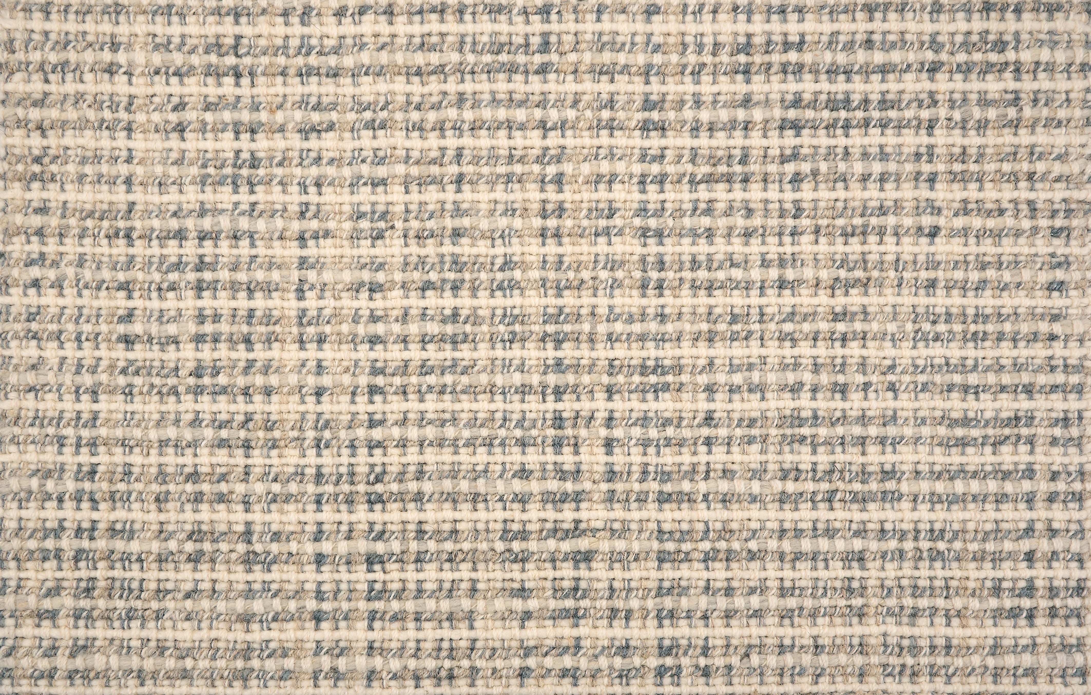 Broadloom carpet with textural weave in cream and slate blue. 