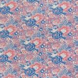 printed linen fabric in a detailed floral pattern in cream, blue and pink on a purple field.