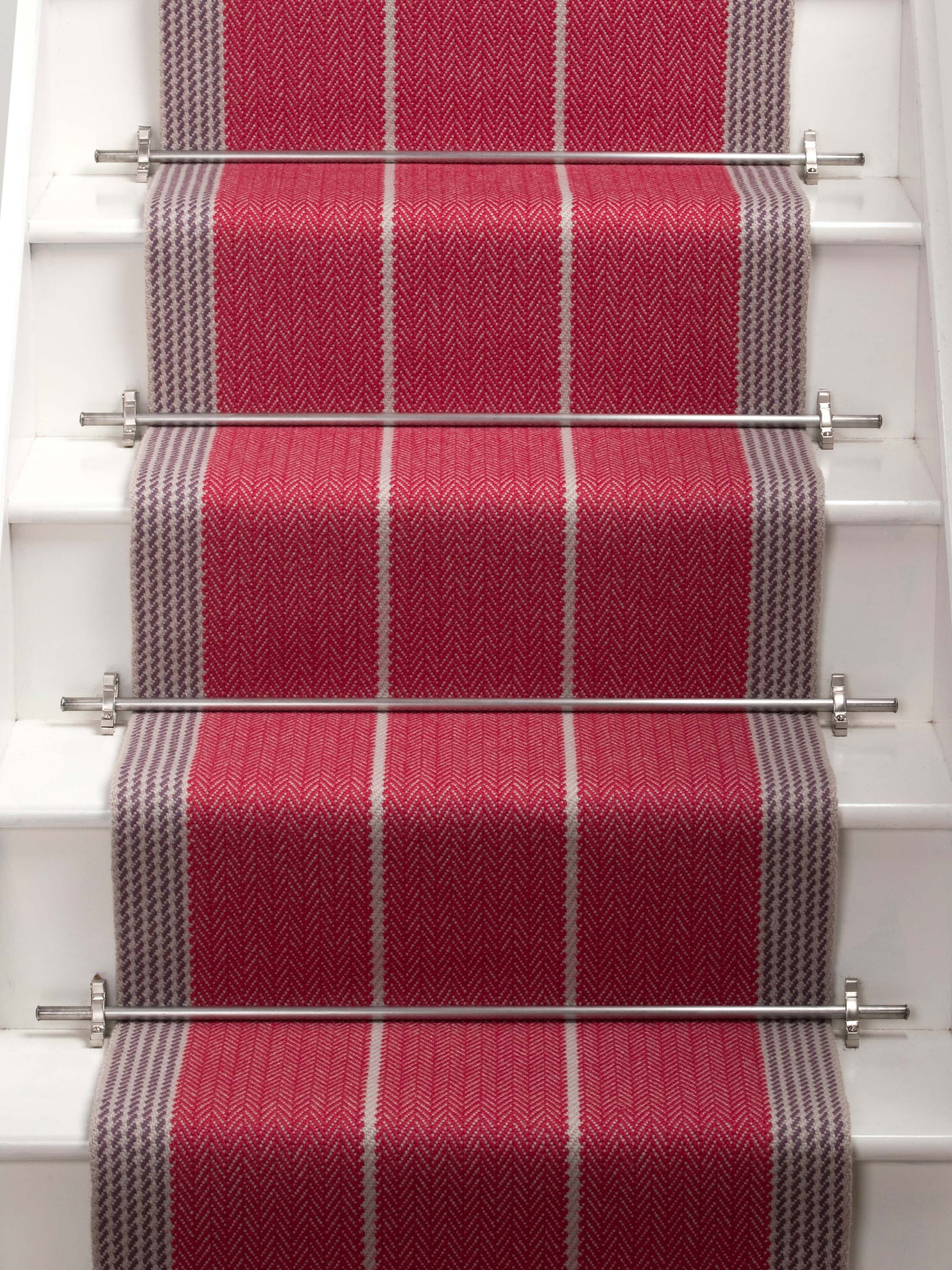 Striped flatweave runner in red and grey on white staircase