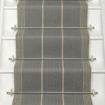 Striped flatweave runner in medium grey on white staircase