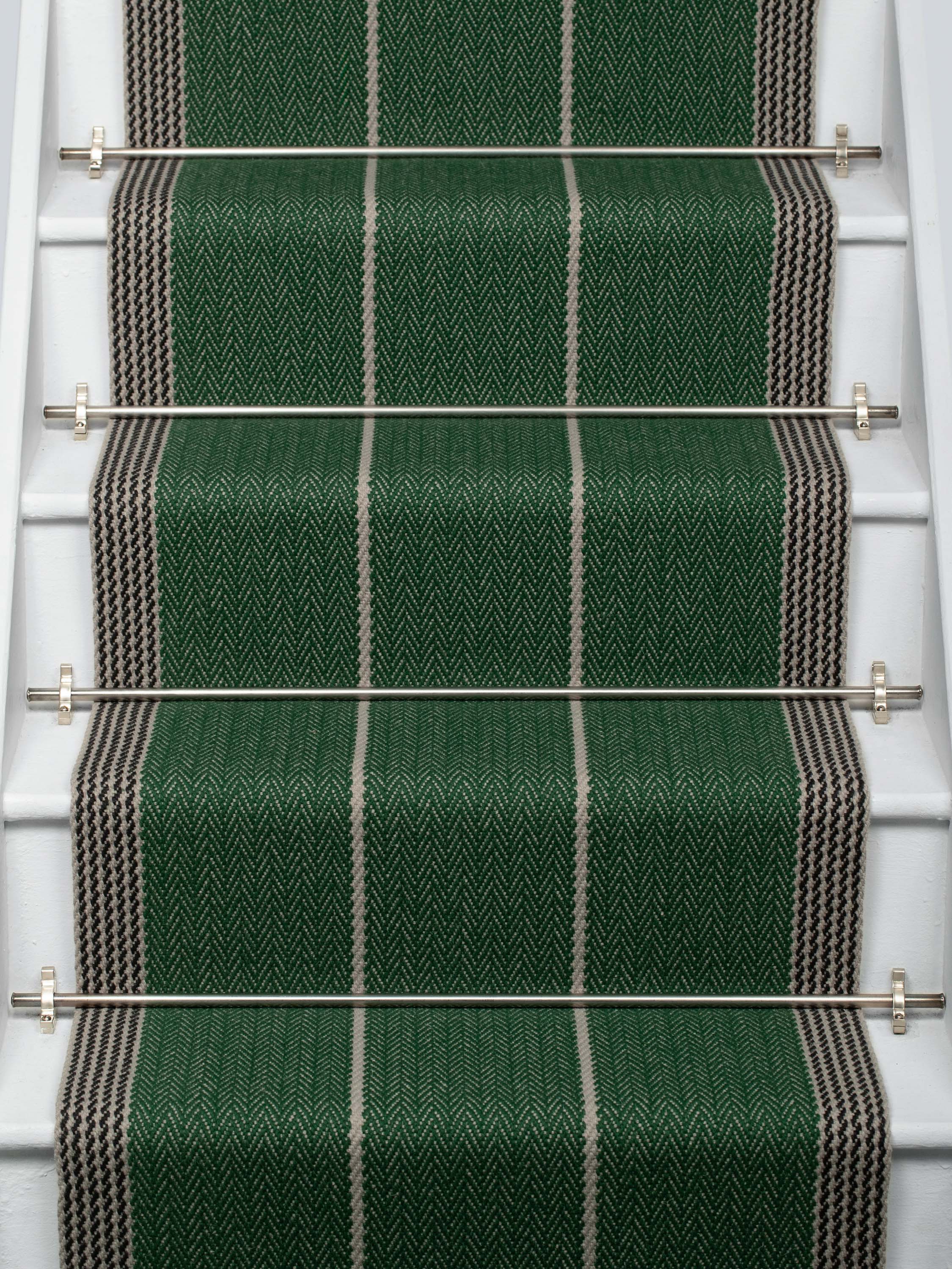 Striped flatweave runner in green and grey on white staircase