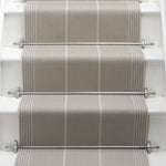 Striped flatweave runner in light grey on white staircase