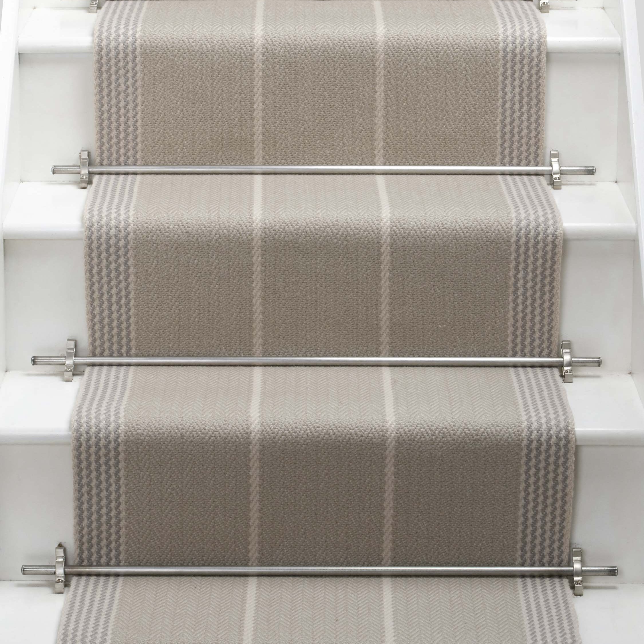 Striped flatweave runner in light grey on white staircase