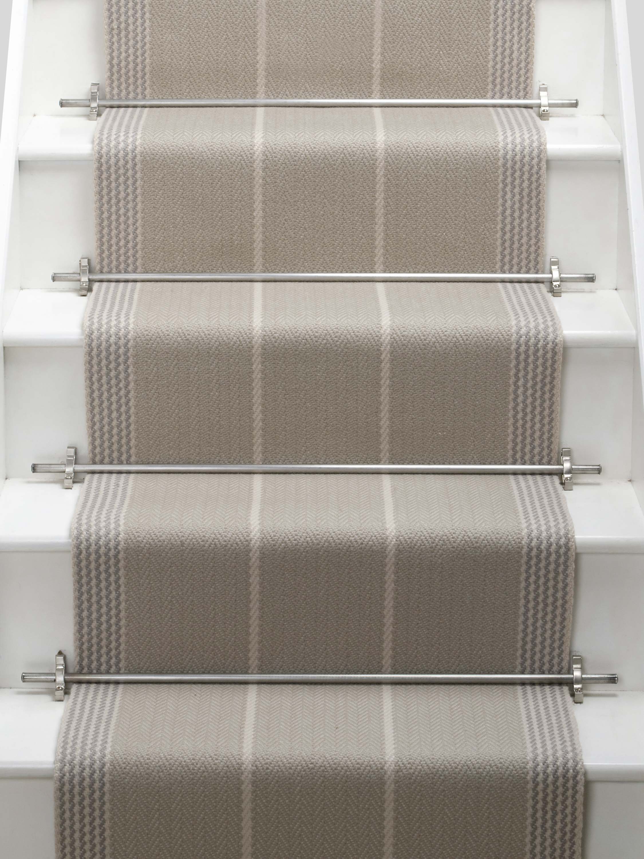 Striped flatweave runner in light grey on white staircase
