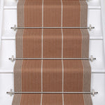 Striped flatweave runner in tan and grey on white staircase