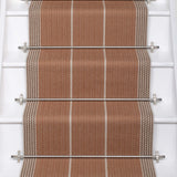 Striped flatweave runner in tan and grey on white staircase