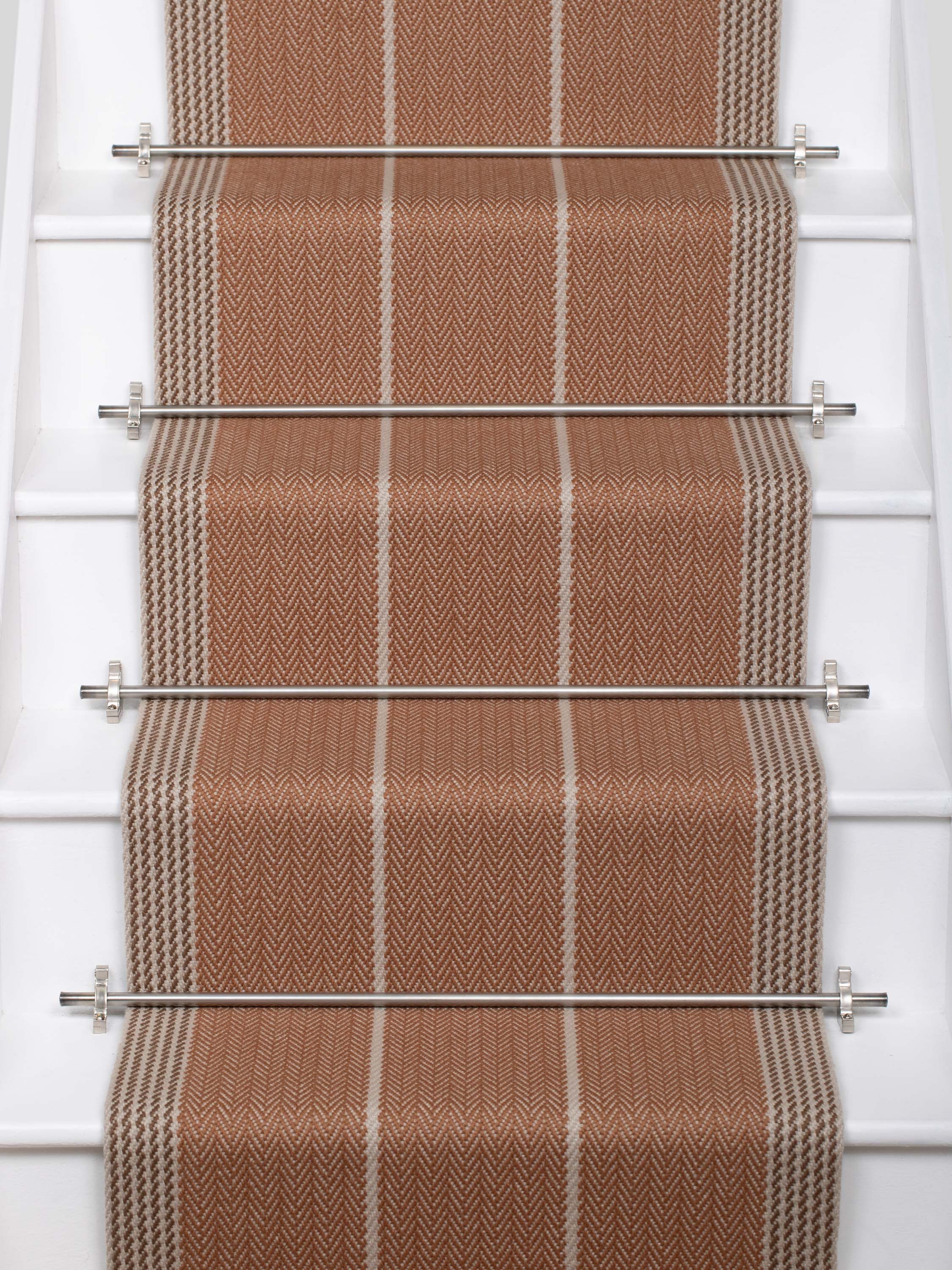 Striped flatweave runner in tan and grey on white staircase