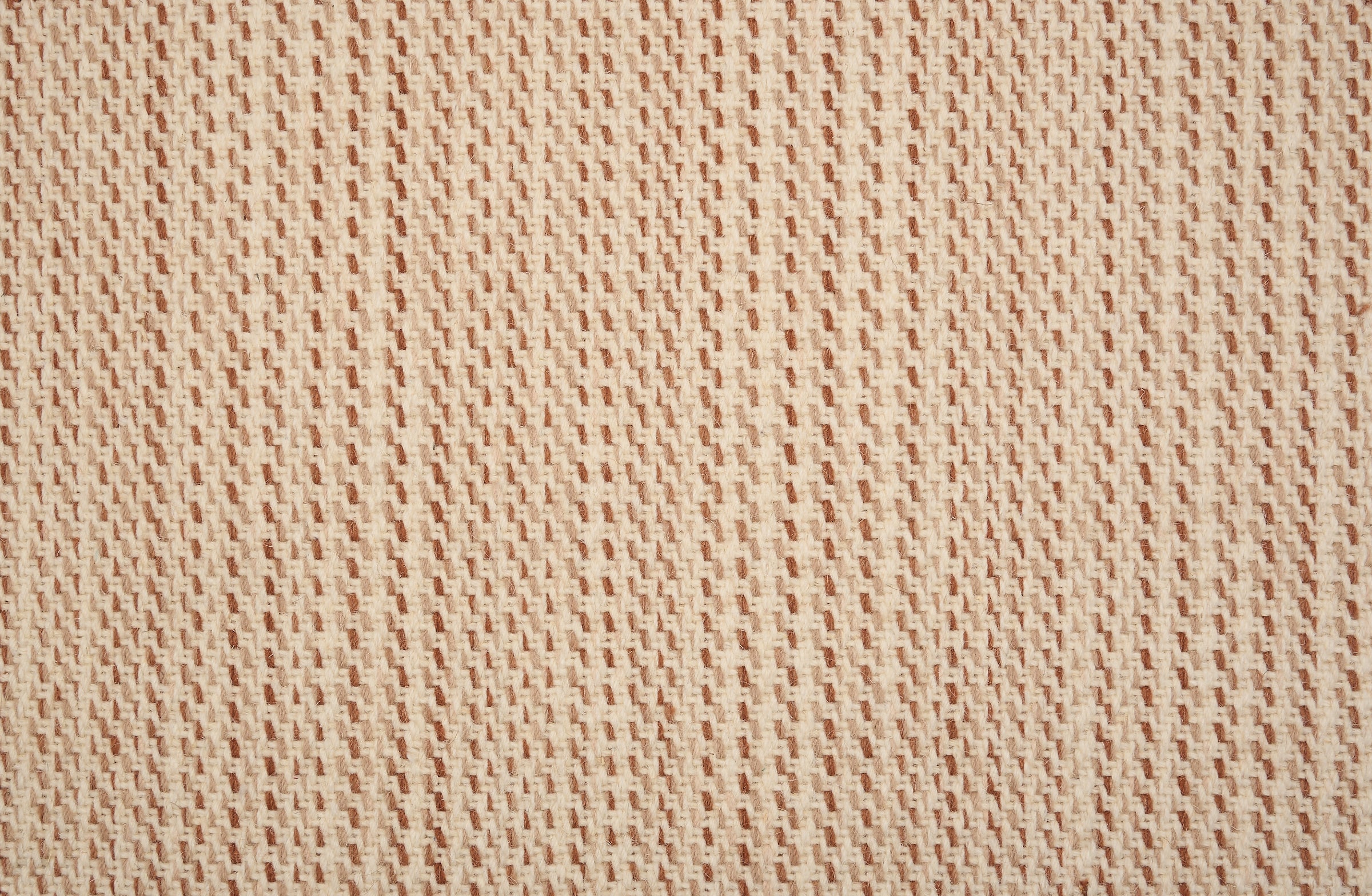 Broadloom carpet in a textural basketweave stripe in cream with stripes of pink and rose red.