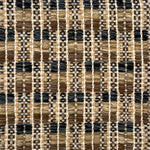 Close-up of a woven rug  with a geometric checker pattern in tan, brown  and blue.