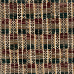 Close-up of a woven rug  with a geometric checker pattern in brown, green and brick red.