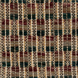 Close-up of a woven rug  with a geometric checker pattern in brown, green and brick red.