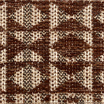 Close-up of a woven rug with geometric pattern in shades of brown.