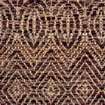 Close-up of a woven rug with subtle geometric design in brown and purple.