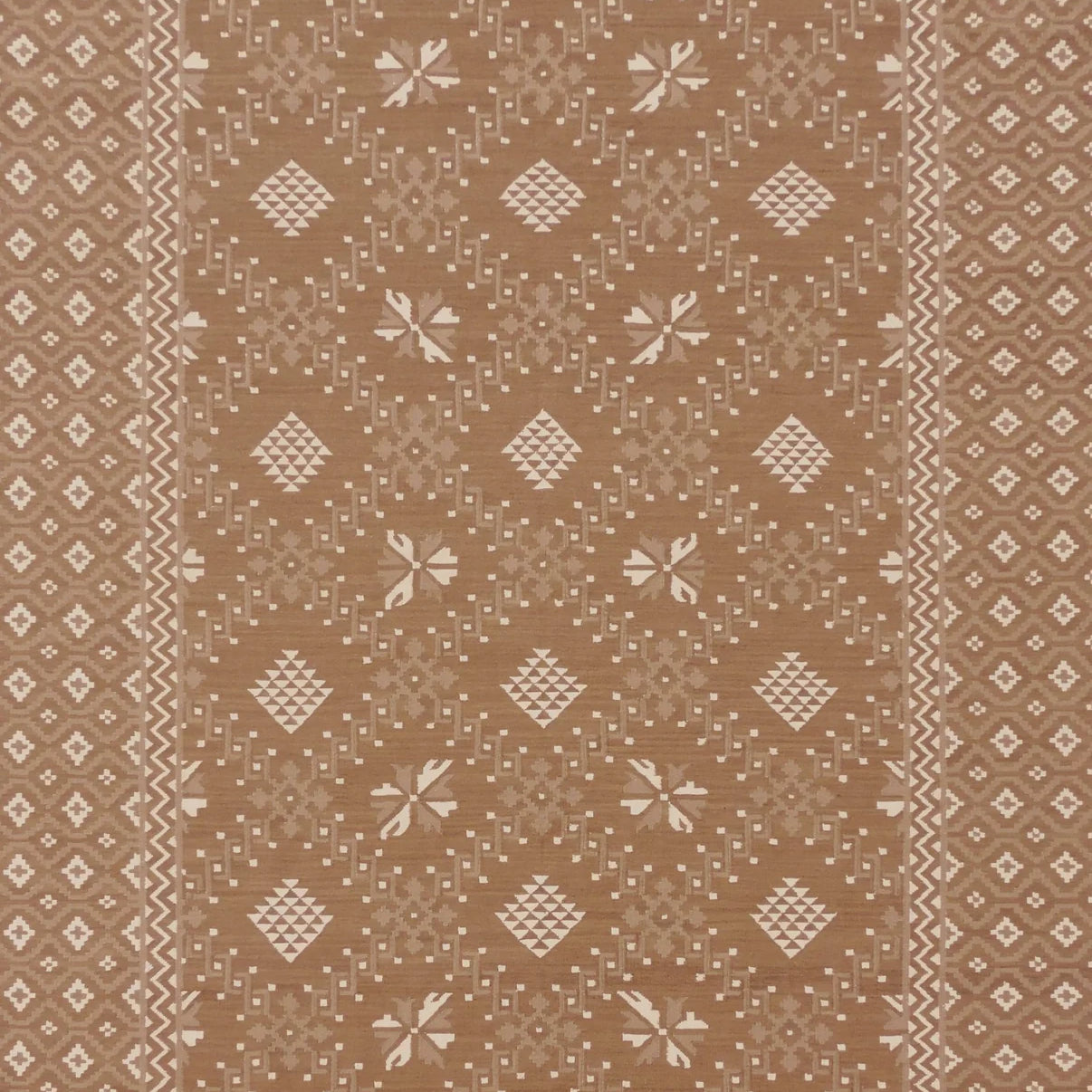 Patterned rug with geometric design on a beige background