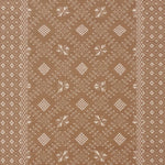 Patterned rug with geometric design on a beige background