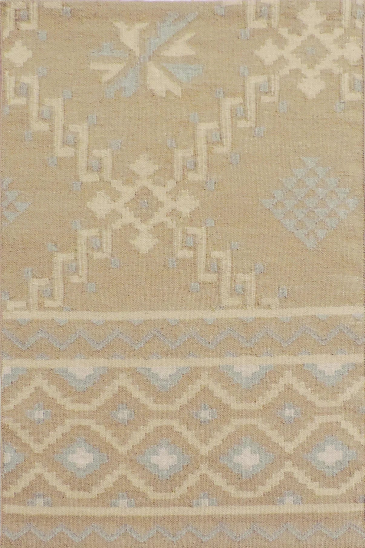 Beige area rug with geometric pattern