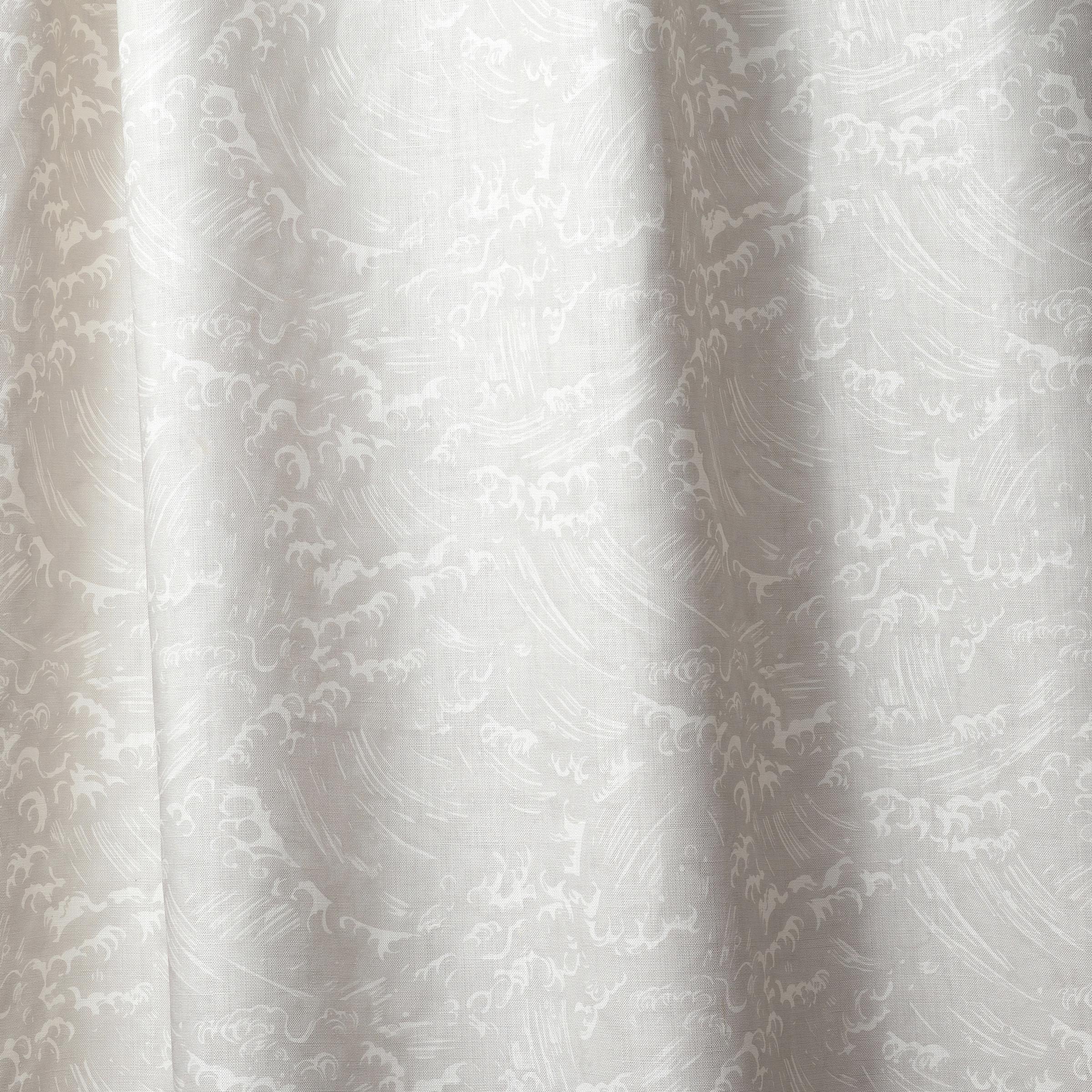 Draped linen in in a playful wave print in white on a pale grey watercolor field.