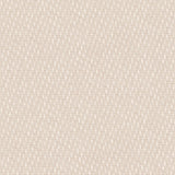 Detail of fabric in a small-scale dot and dash pattern in shades of cream and white on a cream field.
