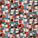 Wallpaper with geometric stained glass pattern pattern with red, blue, brown and white. 