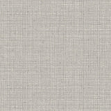 Detail of wallpaper in a textured tweed pattern in shades of gray. 