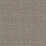 Detail of wallpaper in a textured tweed pattern in shades of brown and gray.