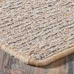 Textured woven mat on a wooden floor