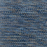 Textured handwoven carpet with a mix of blue colors. 