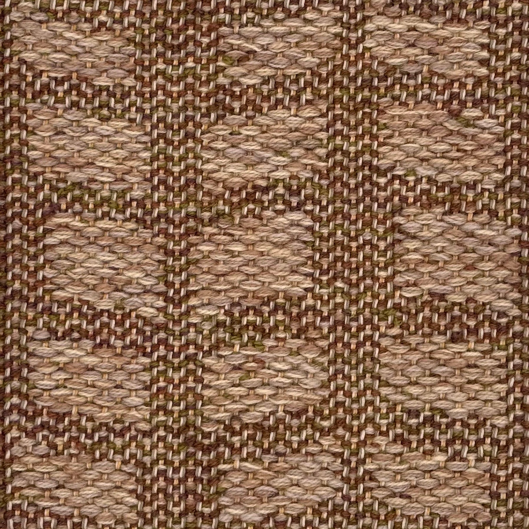A close-up of a woven wool rug with alternating rectangles in warm beige, tan, and brown tones.