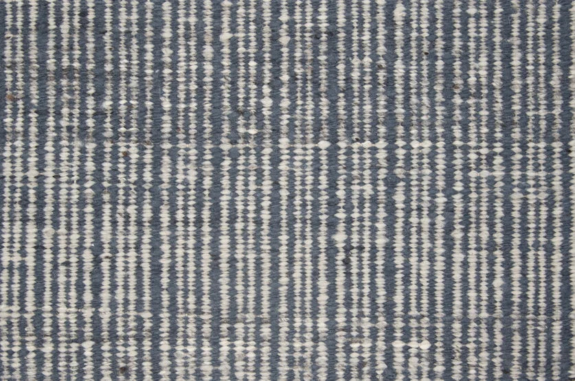 Broadloom carpet swatch in a stripe pattern in a blue design